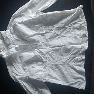 White blouse with extra stitching